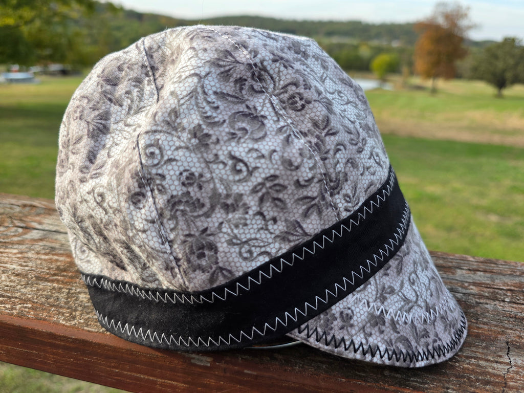 Women's 8-panel welding cap in gray floral lace with black band, reversible side