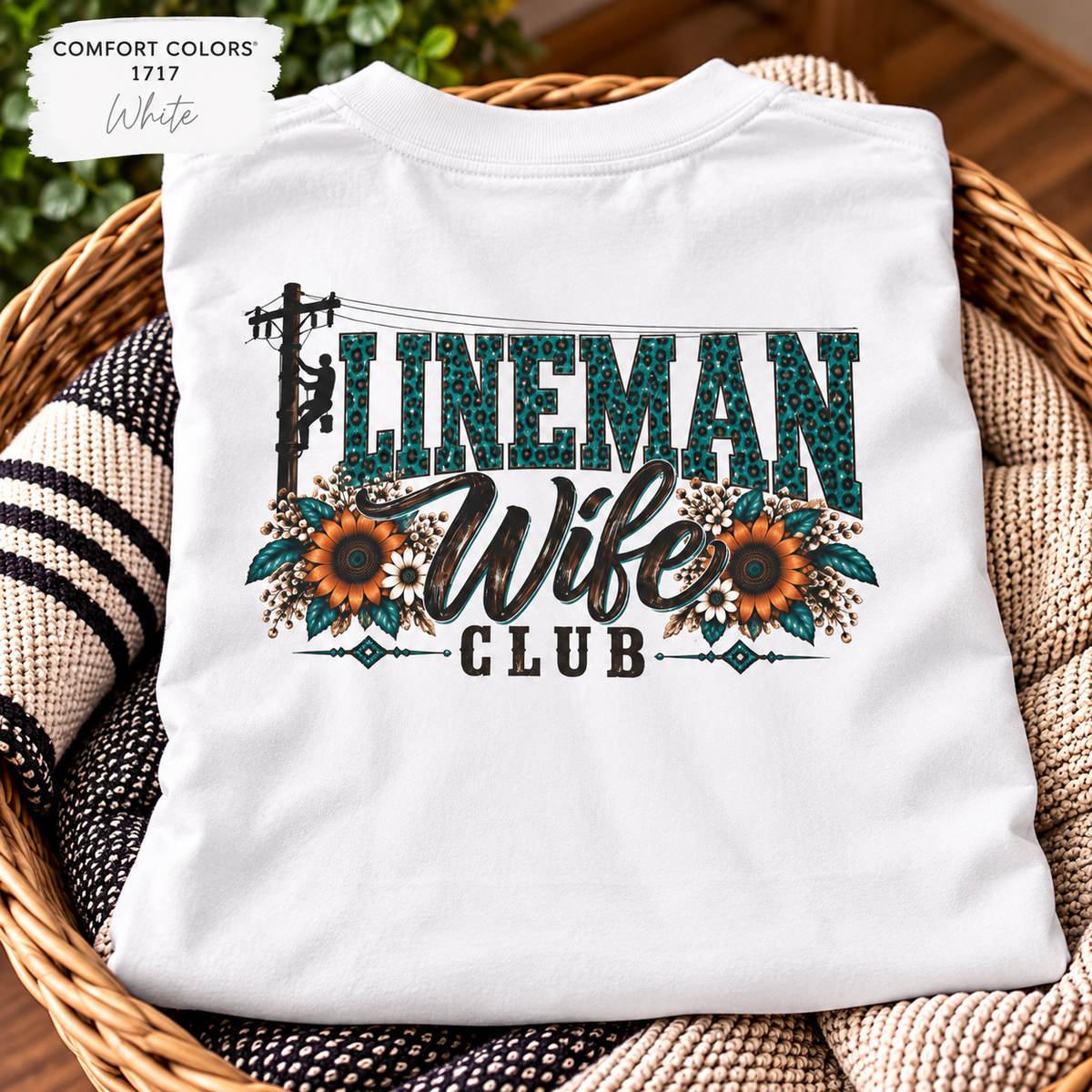 Lineman Wife Club shirt with teal leopard lettering, sunflowers and lineman climbing pole back print