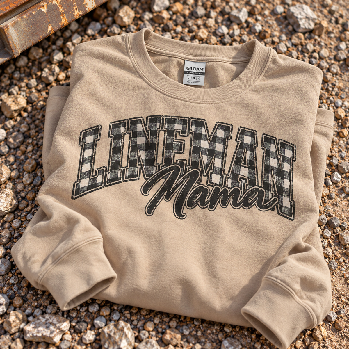 Lineman Mama sweatshirt with buffalo plaid lettering on a white crewneck