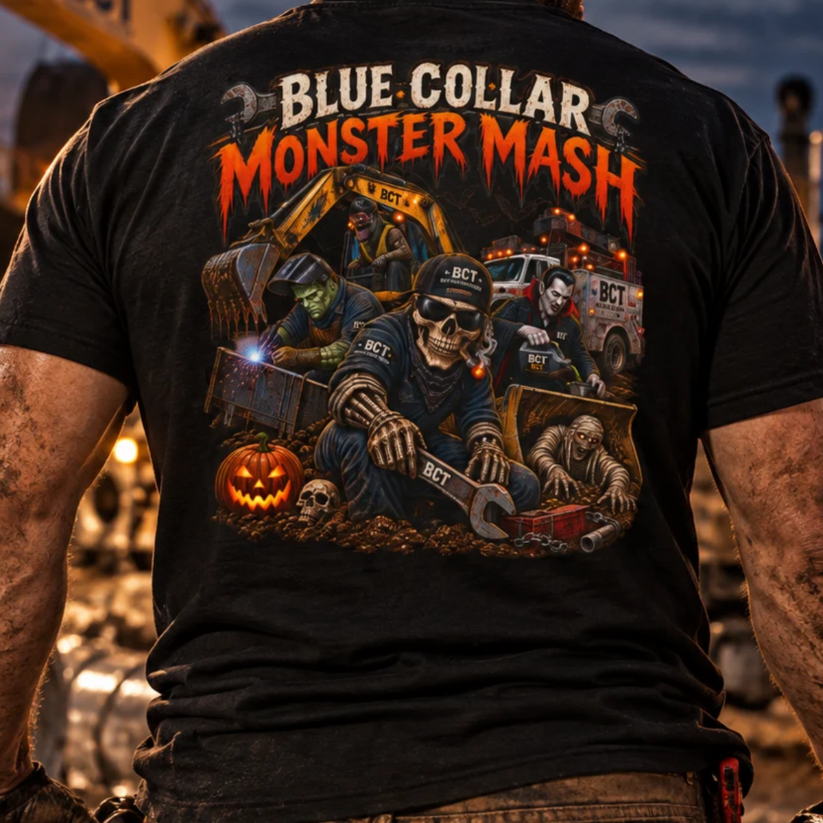 Blue Collar Monster Mash Halloween shirt with skeleton mechanic, Frankenstein welder, mummy and Dracula on a job site back print